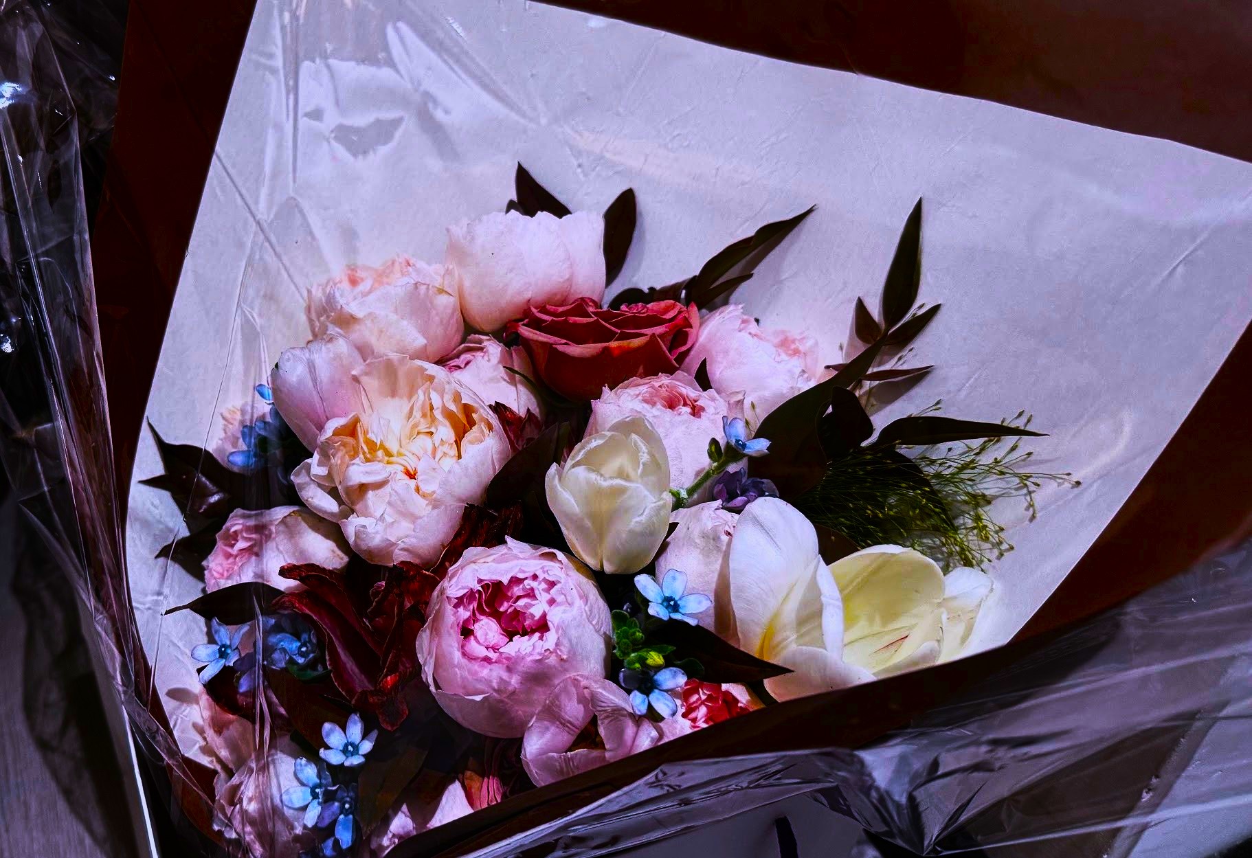 Paper-wrapped bouquet in autumn tones